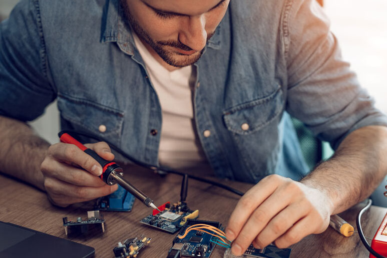 man soldering